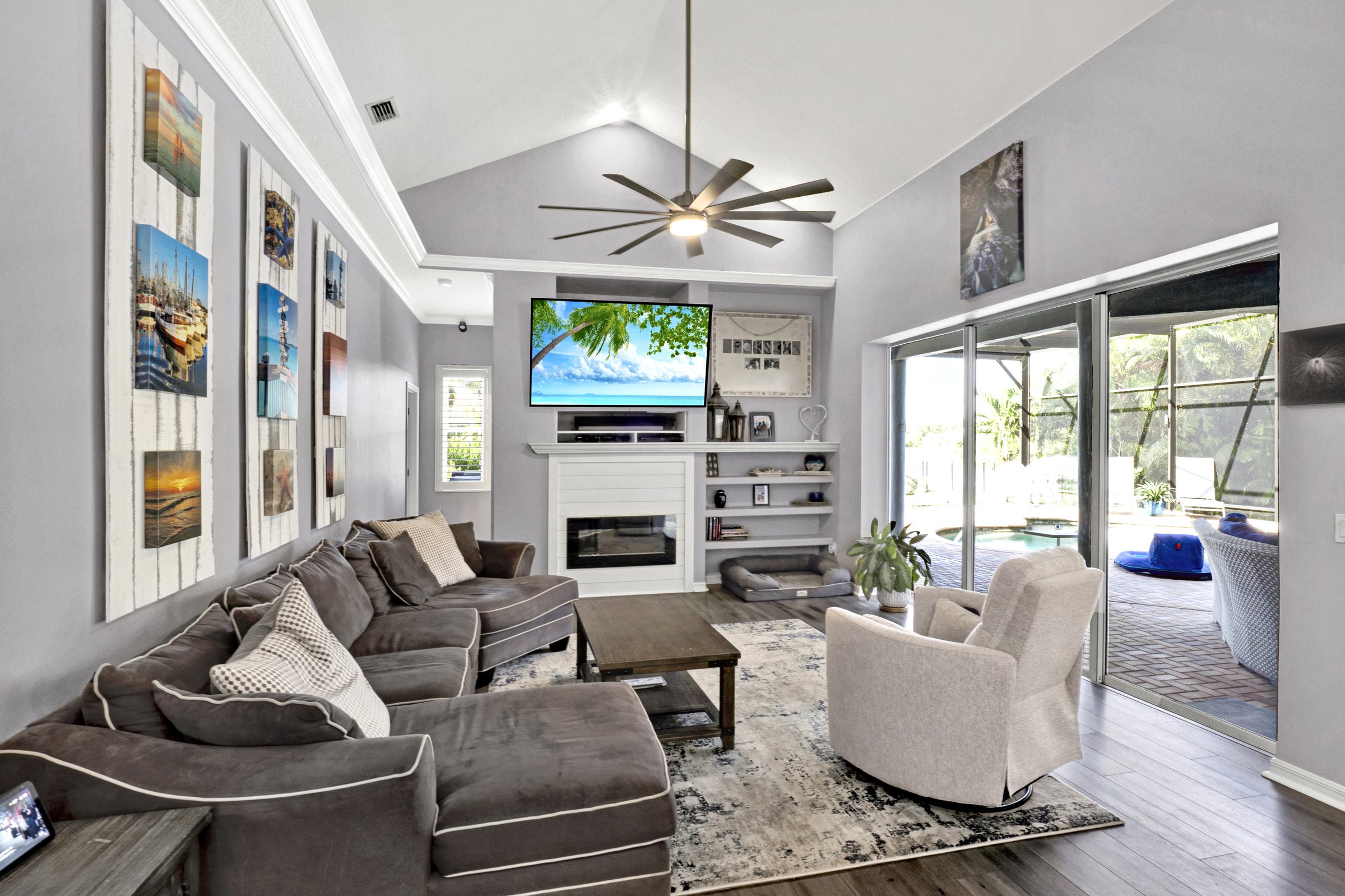 Vaulted-ceiling living room with sliding doors